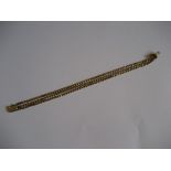 A 14ct gold chain, marked 585 to clasp, 8.8 g.