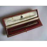 A 9ct gold pen in fitted  Asprey case, stamped 375, bearing initials "J.S 1956 - 1981".