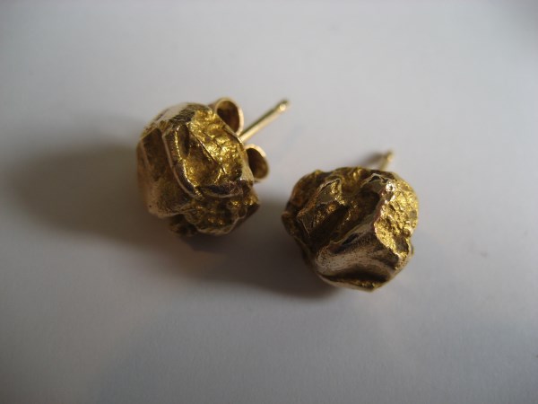 A pair of 15ct gold earrings, stamped 585, 3.7g.