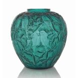 A Perruches Vase, No. 876
designed 1919, teal green and white stained
10 in. (25.5 cm.) high
moulded