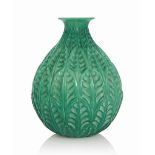 A Malesherbes Vase, No. 1014
designed 1927, cased jade and white stained
9 3/8 in. (23.8 cm.) high