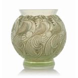 A Le Mans Vase, No. 1074
designed 1931, opalescent green and white stained
4 in. (10 cm.) high