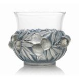 A Prunes Vase, No. 1037
designed 1930, clear, frosted and blue stained
7 in. (17.8 cm.) high
wheel-