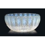 A Perruches Bowl, No. 419
designed 1931, opalescent and blue stained
9 7/8 in. 25 (cm.) diameter