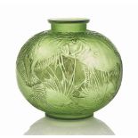 A Poissons Vase, No. 925
designed 1921, lime green and white stained
9 ¾ in. (25 cm.) high
moulded