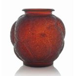A Tortues Vase, No. 966
designed 1926, deep amber and white stained
10 ¾ in. (27.2 cm.) high