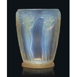 A Danaides Vase, No. 972
designed 1926, opalescent
7 ¼ in. (18.5 cm.) high
wheel-engraved R. LALIQUE