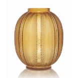 A Biskra Vase, No. 1078
designed 1932, amber
11 ½ in. (29.2 cm.) high
stencilled R. LALIQUE FRANCE