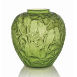 A Perruches Vase, No. 876
designed 1919, lime green and white stained
10 in. (25.5 cm.) high
moulded
