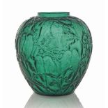 A Perruches Vase, No. 876
designed 1919, emerald green and white stained
10 in. (25.5 cm.) high