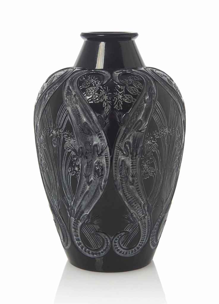 A Lezards et Bluets Vase, No. 879
designed 1913, black and white stained
13 ½ in. (34.2 cm.) high