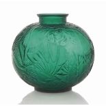 A Poissons Vase, No. 925
designed 1921, emerald green
9 ½ in. (24.2 cm.) high
moulded R. LALIQUE (