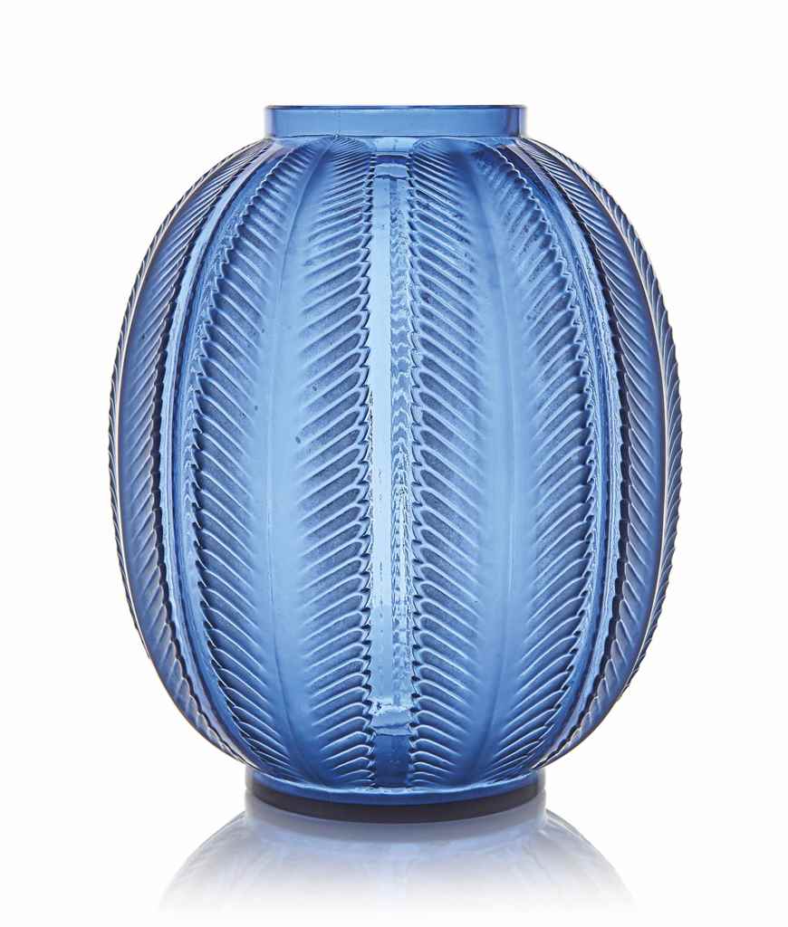 A Biskra Vase, No. 1078
designed 1932, sapphire blue and white stained
11 ½ in. (29.2 cm.) high