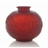 A Poissons Vase, No. 925
designed 1921, double cased red
9 ½ in. (24.2 cm.) high
moulded R. LALIQUE,