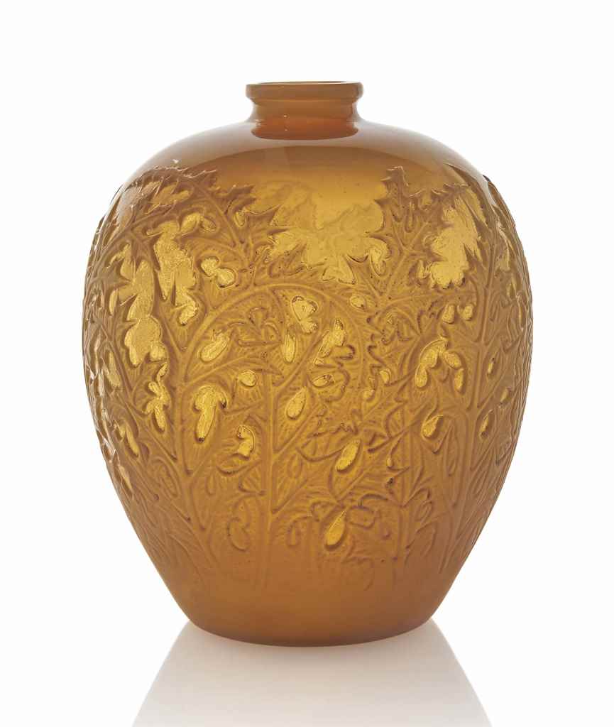 An Acanthes Vase, No. 902
designed 1921, cased butterscotch and white stained
11 ¾ in. (30 cm.) high