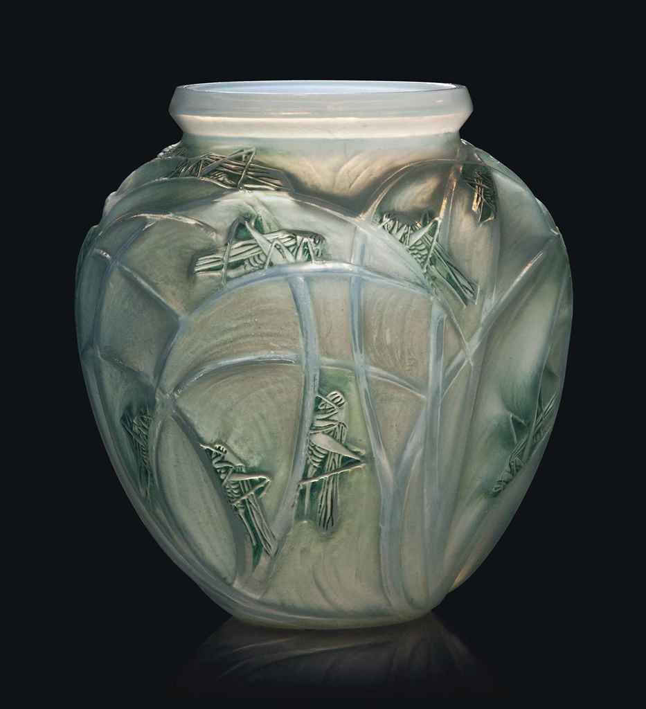 A Sauterelles Vase, No. 888
designed 1912, cased opalescent, and blue and green stained
11 ¼ in. (