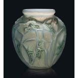 A Sauterelles Vase, No. 888
designed 1912, cased opalescent, and blue and green stained
11 ¼ in. (