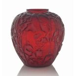 A Perruches Vase, No. 876
designed 1919, cased red and white stained
10 in. (25.5 cm.) high
engraved