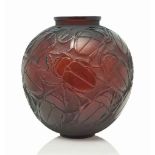 A Gros Scarabees Vase, No. 892
designed 1932, deep amber
11 ¾ in. (30 cm.) high
moulded R.