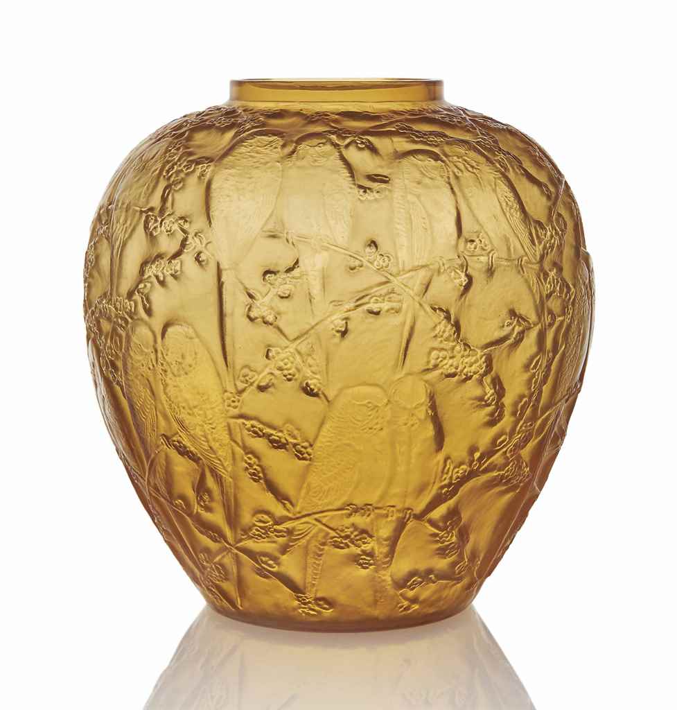 A Perruches Vase, No. 876
designed 1919, cased yellow
10 in. (25.5 cm.) high
moulded R. LALIQUE,