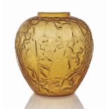 A Perruches Vase, No. 876
designed 1919, cased yellow
10 in. (25.5 cm.) high
moulded R. LALIQUE,