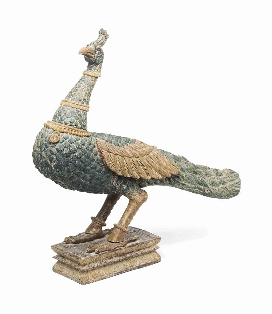 A LARGE WOODEN PEACOCK SOUTH INDIA, LATE 19TH CENTURY On rectangular plinth, realistically carved in