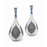 A PAIR OF LARGE GILT BLUE AND WHITE BOTTLE VASES SAMSON, FRANCE, CIRCA 1870-1880 Each with drop-