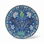 A POTTERY DISH IN THE IZNIK 'DAMASCUS' STYLE ULISSE CANTAGALLI, FLORENCE, ITALY, LATE 19TH CENTURY