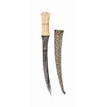 A MARINE-IVORY WATERED-STEEL DAGGER (KHANJAR) QAJAR IRAN, 19TH CENTURY Of typical form, with