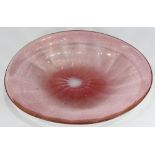 Italian Murano glass platter, circa 1950, having an oval form, executed in pink with gold dust