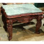 Renaissance style mahogany occasional table, having a shaped green marble top, above the pierce
