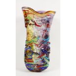 Italian Murano end of day vase, the organic form with applied glass and cane accents flanking the