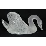 Lalique France swan figure, the frosted to clear form depicted with its head down, having an