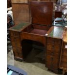 English mahogany desk, having a rectangular embossed leather lift top (in 3 parts), circa 1900,