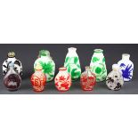 (lot of 10) Chinese overlay glass snuff bottles, consisting of five overlaid on white glass