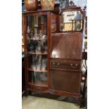 Victorian mahogany side-by-side cabinet, one side having a bow front glass front with adjustable