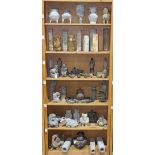 (lot of approximately 51) Six shelves of Chinese archaistic hardstone decorative items, including