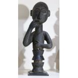 Akan, Ghana, anecdotal half-figure with head, torso, and gesturing arms in symbolic pose, its