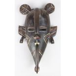 Koulango, Cote D'Ivoire mask with hornbill bird neck to beak coming way down from top of forehead,