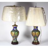 Pair of Chinese cloisonne vases, mounted as lamps, with taotie within lappets above additional