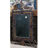 Italian Rococo style mosaic framed mirror, having an urn decorated crest, above the mosaic frame