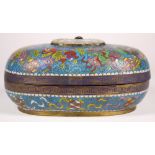 Chinese cloisonne box, the lid enameled with fu-lions framing a bat above an inset hardstone pierced