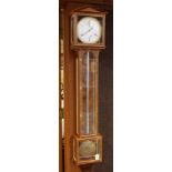 Mahogany inlaid one year Laterndluhr wall regulator clock, having an 8" porcelain dial surmounting