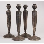 (lot of 4) American Clarence Vanderbilt weighted sterling silver candle holders, each of a Neo-