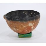 Cypriot polished redware bowl, having a black slip interior, bronze age, 6"h