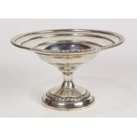 American weighted sterling silver compote by Columbia, set with a gardrooned border and having a