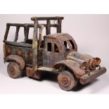 American primitive style patinated metal and wood model truck, 16"h x 24"w x 12.5"d