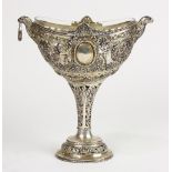 Continental Renaissance style pierced silver-plate compote having a glass liner, and decorated