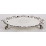 English George II sterling silver salver, by Ebenezer Coker, London, 1756, sitting on figural claw