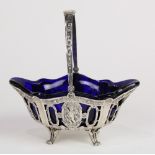 German Renaissance style .800 silver pierced quatrefoil basket having a cobalt glass liner, accented